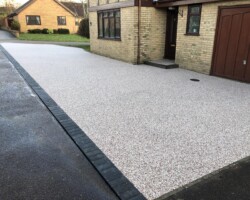 After - Charcoal Block Edging Installed With Titan Silver Resin