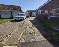 Before - Badly Broken Concrete Driveway