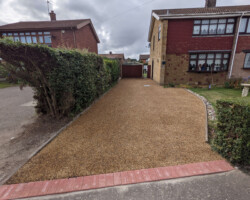 After - Red Block Edging Installed Finished With Tar And Stone