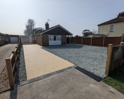 After - Charcoal Edging Installed, New Manhole, New Granite Stone Area, Finished In Cornfield