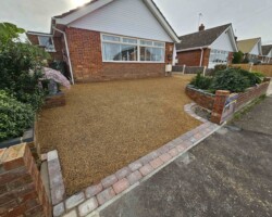 After - Paved Edging & Tar & Golden Stone Installed