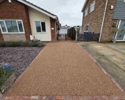 After - Brindle Block Edging Installed - 2 New Recess Manholes - Finished In Evening Rose Resin Bound