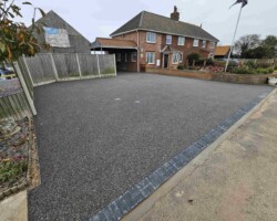 After - Charcoal Block Edge Installed / Graphite Resin Bound Finish