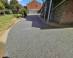 After - Charcoal Block Edge / Finished in Anthracite & Farmhouse Gold Resin Bound