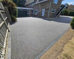 After - Charcoal Block Edge / Finished in Anthracite & Farmhouse Gold Resin Bound